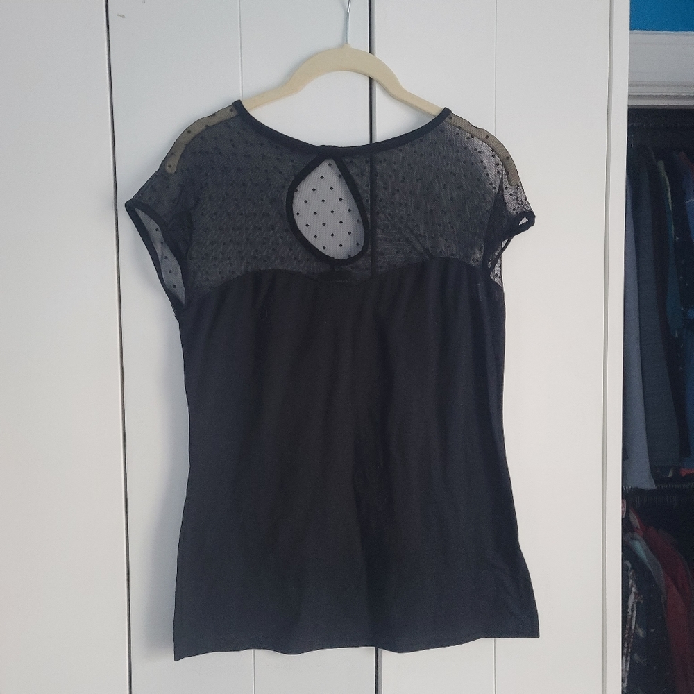 Rock Steady black retro top. Lace polka design on top. Size large